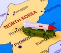 Map of North Korea with a military machine
