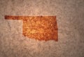 Map of oklahoma state on a old vintage crack paper background Royalty Free Stock Photo