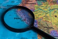 Map of Peru through magnifying glass.Close-up. Royalty Free Stock Photo