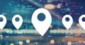 Map pin concept with blurred city lights Royalty Free Stock Photo