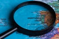 Map of Portugali through magnifying glass.Close-up. Royalty Free Stock Photo