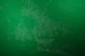 Map of the streets of Abijan (Ivory Coast) made with white lines on abstract green background lit by two lights