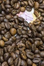 Map of Uganda under a background of coffee beans Royalty Free Stock Photo