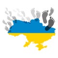 Map of Ukraine and prints of bare feet of a person. The concept of flight, migration, evacuation from Ukraine