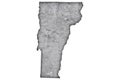 Map of Vermont on weathered concrete