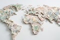 Map of the world crafted entirely from various denominations of currency representing different countries, showcasing Royalty Free Stock Photo