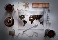 Map of the world, lined with tea leaves. Eurasia, America, Australia, Africa. vintage. sugar, note, cracker, spoon . top