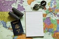 Map of the world with notepad, passport,compass an Royalty Free Stock Photo