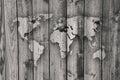 Map of the world on weathered wood