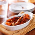 Maple glazed carrots with walnuts Royalty Free Stock Photo