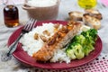 Maple glazed salmon with caramelized onions and rice