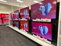 Various flat screen tv sets on display for sale at a Target store in the electronics