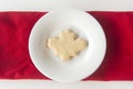 Maple Leaf Shaped Cookie on White Plate