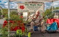 The Maple Man Playing Guitar, Singing and Selling