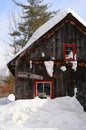 A maple sugar house under heavy snow Royalty Free Stock Photo