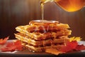 maple syrup drizzling over waffles