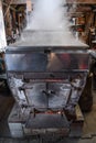 A maple syrup evaporator and boiler in a New Hampshire sugar shack.