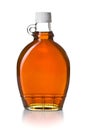 Maple syrup in glass bottle Royalty Free Stock Photo