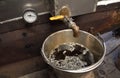 A bucket of fresh maple syrup at a New Hampshire sugar shack. Royalty Free Stock Photo