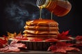 maple syrup pouring onto a stack of pancakes Royalty Free Stock Photo