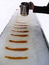 Maple taffy on snow.