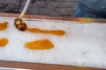 Maple taffy on snow during sugar shack period