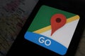 Maps and iphone 11 pro with the Google Maps logo Royalty Free Stock Photo