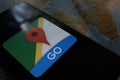 Maps and iphone 11 pro with the Google Maps logo Royalty Free Stock Photo