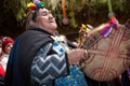 Mapuche machi plays the drum in ancestral ceremony