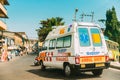 Mapusa, Goa, India. Ambulance Car Moving With Siren Emergency Ambulance Reanimation Van Car On Street.
