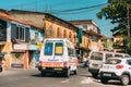 Mapusa, Goa, India. Ambulance Car Moving With Siren Emergency Ambulance Reanimation Van Car On Street.