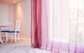 Vintage luxury interior white wood chairs with carpet and pink curtain