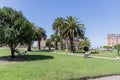 Mar del Plata, Argentina - December 30th, 2023: People resting in the Plaza Colon in Mar del Plata