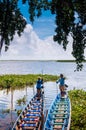 Phatthalung, Thailand - Local wooden tourist boat for nature trail excursion of Talay Noi, Ramsar wetland resevoir of