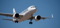 Marabu Airlines flies in the blue sky. Landing at Tenerife Airport