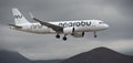 Marabu Airlines flies in the dark clouds. Landing at Tenerife Airport