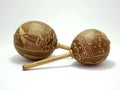 Maracas. Percussion musical instrument. Music. Carved wooden and cane maracas. Rattles Travel memories. Souvenirs. white.