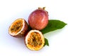 Maracuja cut in half and whole with leaf on white background. Passion fruit yellow with fruit juice and seeds