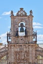 Maragato Colas and Maragata Colasa chiming the clock on top of the town hall of Astorga, Spain