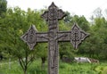 Maramures, Romania-June 14 2018 : Traditional carved ancient wooden gravestone cross