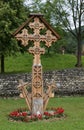 Maramures, Romania-June 14 2018 : Traditional carved ancient wooden gravestone cross