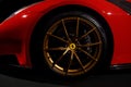 Maranello, Italy - April 01, 2023: Close-up of Ferrari luxury car with metal disk and brand brakes.