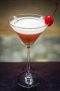 Maraschino cherry martini cocktail drink glass Royalty Free Stock Photo