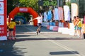 Marathon athlete at finish. Happy marathon runner finish line Royalty Free Stock Photo