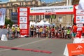 Marathon with children. Kid runners at starting line at summer maraton