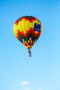 Marathon City, Wisconsin, USA, July 9, 2021, Taste N Glow Balloon Fest just West of Wausau. Hot air balloon with the USA flag