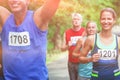 Marathon male athlete crossing the finish line Royalty Free Stock Photo