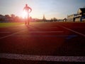 Marathon man training. Sportsman in running clothes on stadium