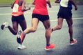 Marathon runner legs running Royalty Free Stock Photo