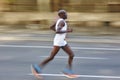 Marathon runner in motion on the street. Healthy lifestyle